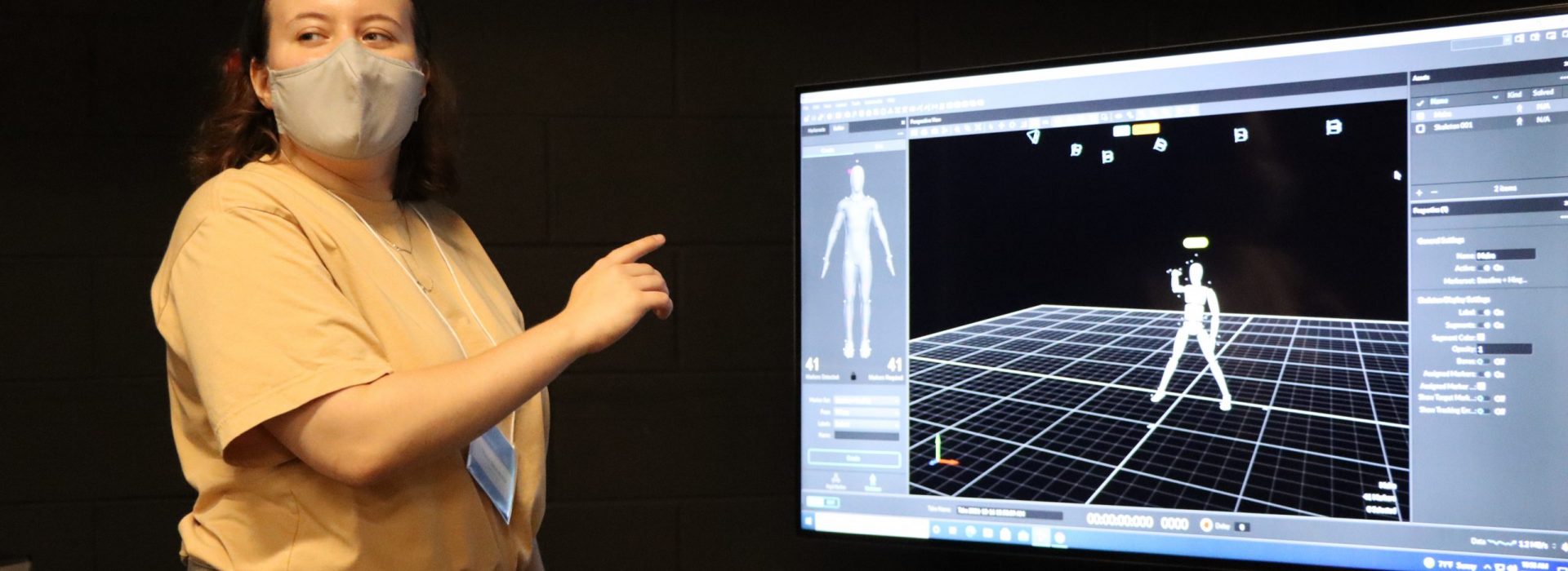 Student pointing at live motion capture